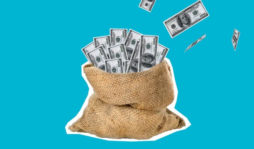 Burlap sack filled with hundred dollar bills against a clean blue background, symbolizing wealth and savings.